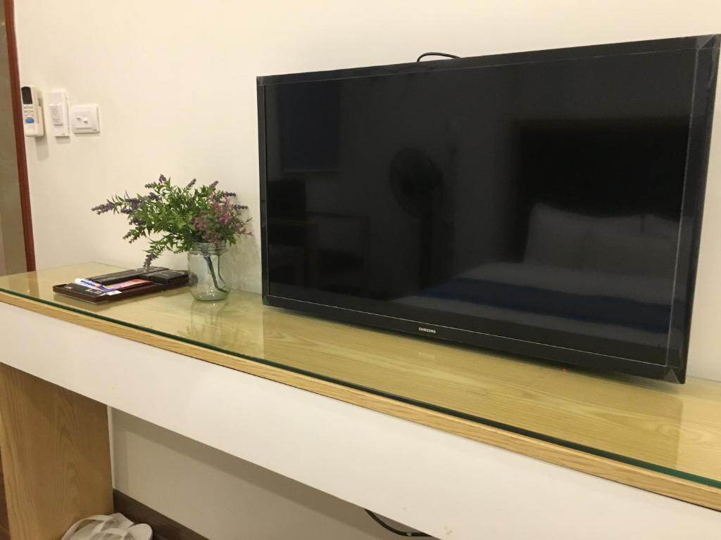 TV a/nebo společenská místnost v ubytování Hotel Royal