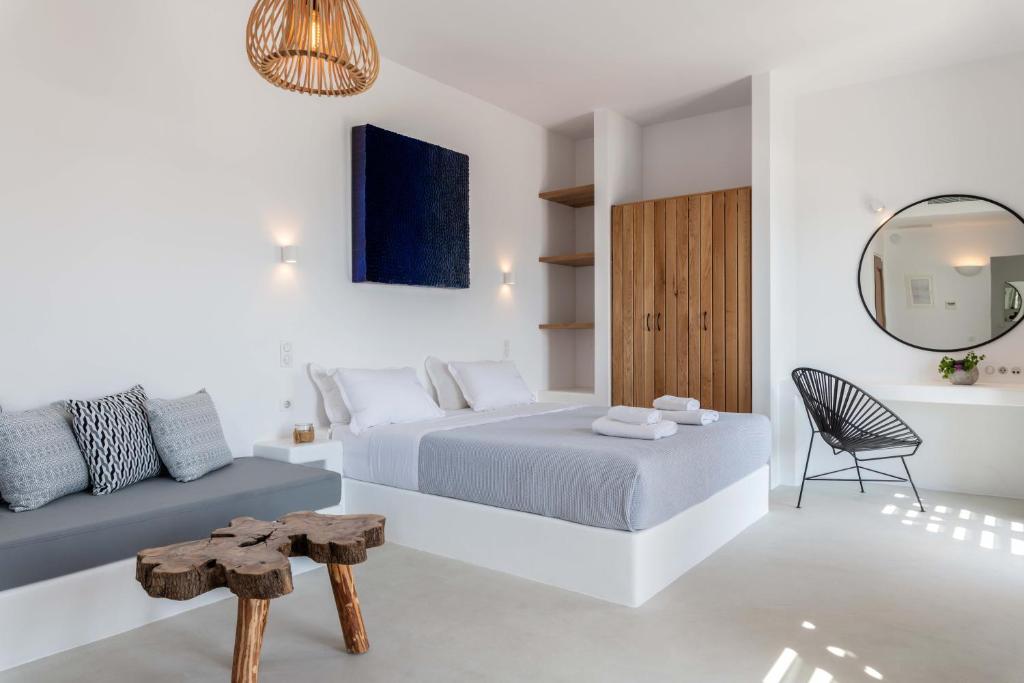 Postel nebo postele na pokoji v ubytování Trinity Mykonos - Beachfront Villa