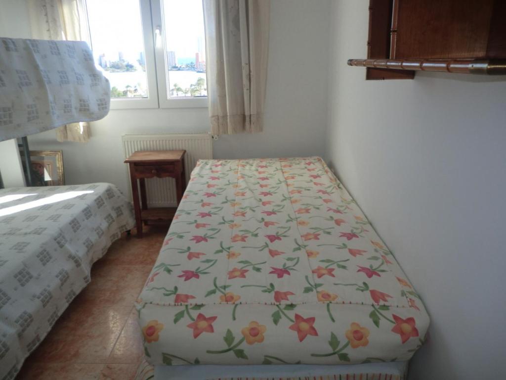 Postel nebo postele na pokoji v ubytování EDIFICIO OASIS