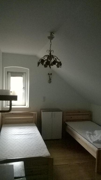 Postel nebo postele na pokoji v ubytování Raisa Apartments Fünkhgasse