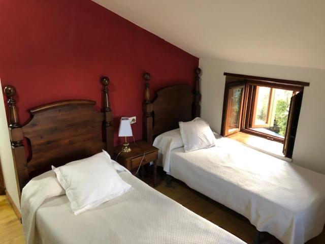 Cama o camas de una habitación en Casa Navarro