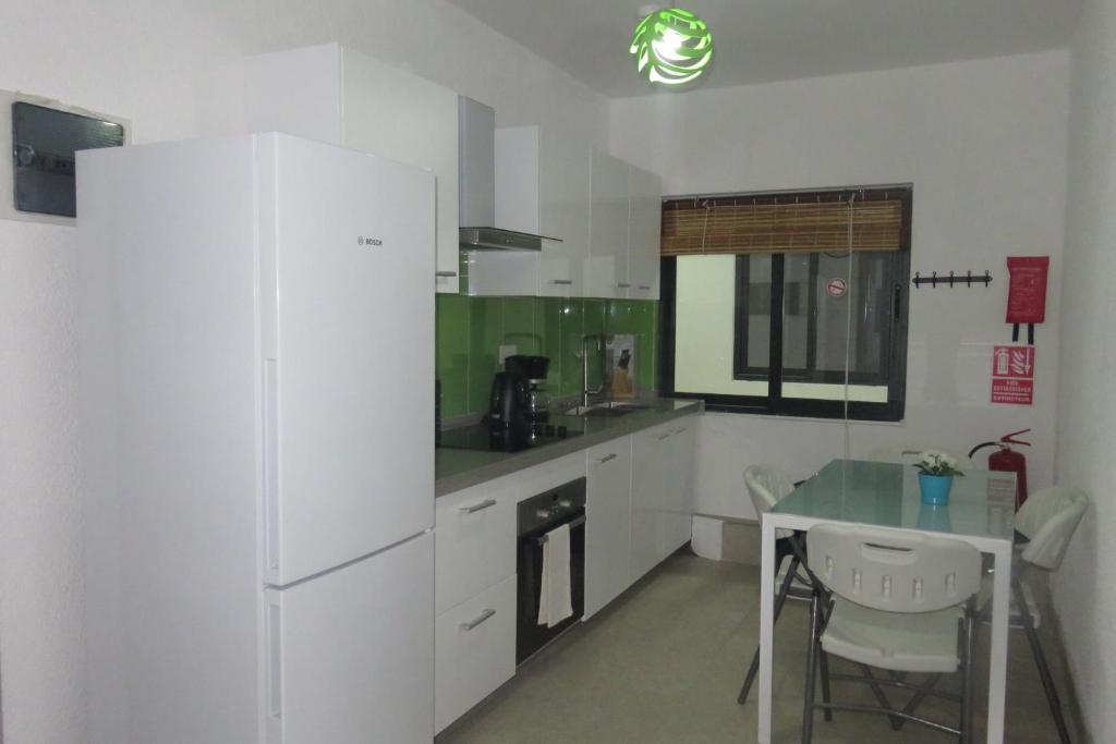 Kuchyň nebo kuchyňský kout v ubytování Ibiz Tourist Residence 2