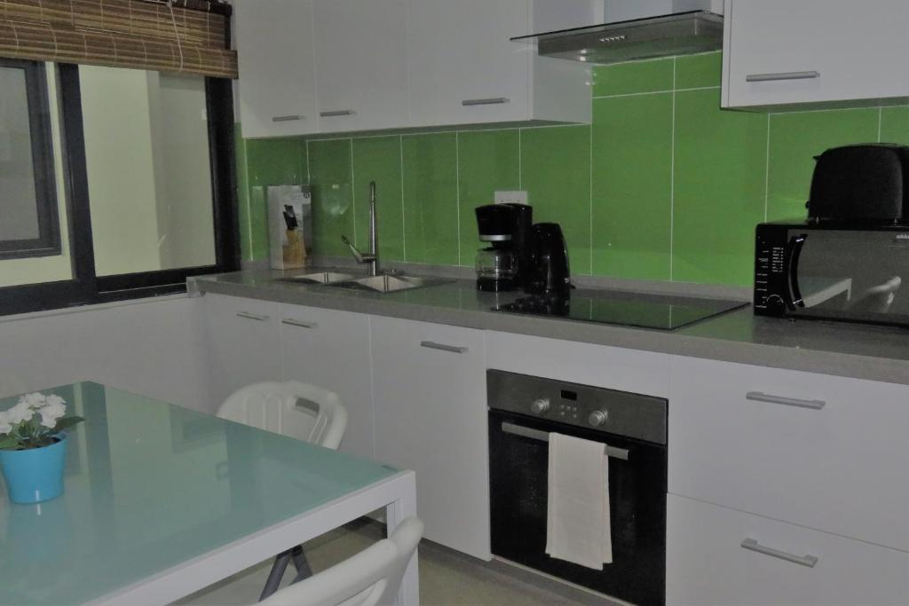 Kuchyň nebo kuchyňský kout v ubytování Ibiz Tourist Residence 2