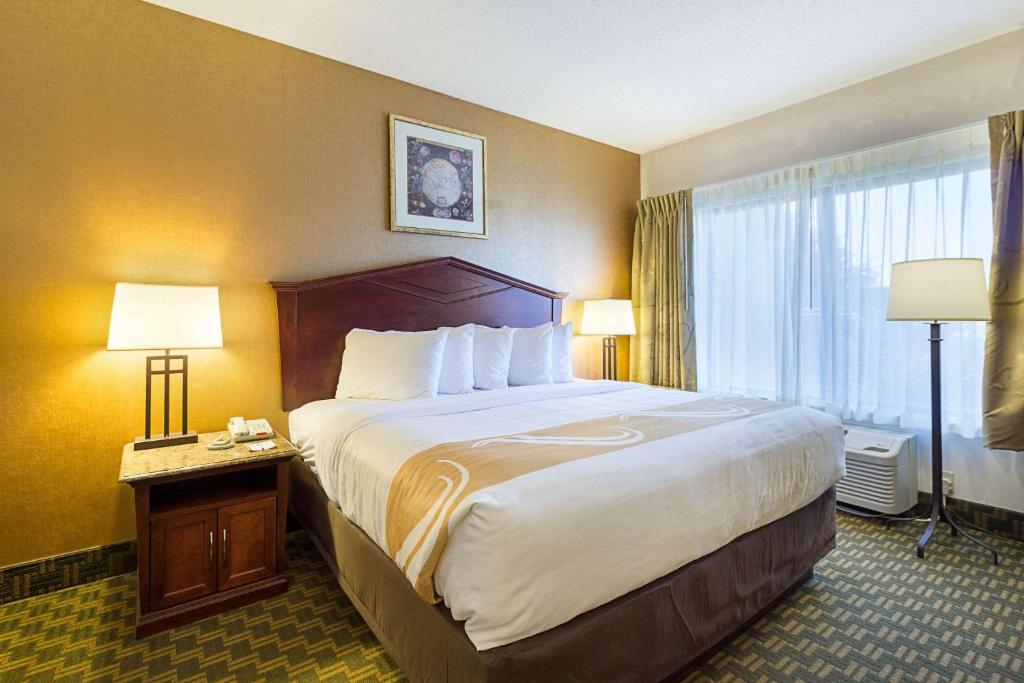 Postel nebo postele na pokoji v ubytování Quality Inn