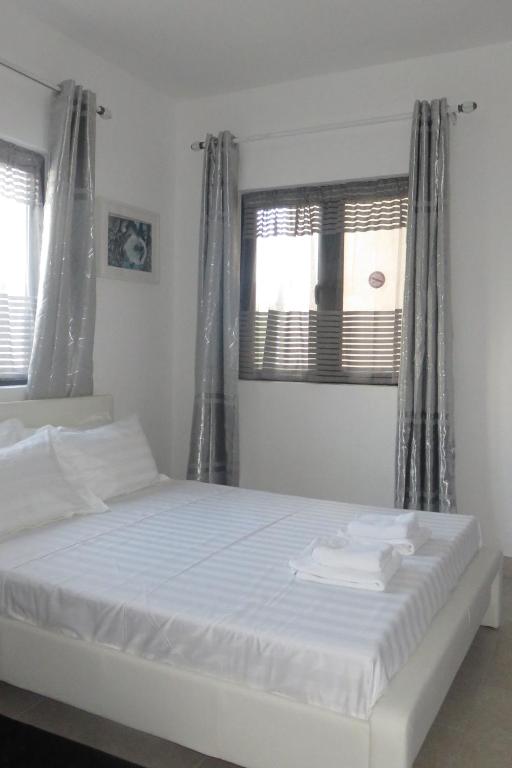 Postel nebo postele na pokoji v ubytování Ibiz Tourist Residence 2