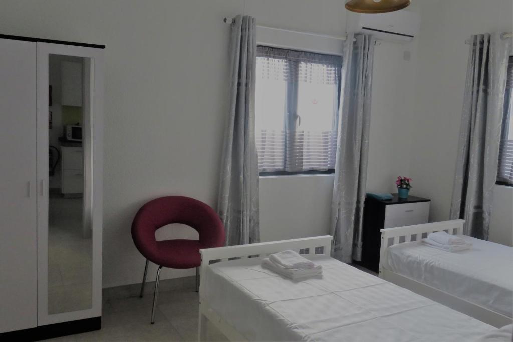 Postel nebo postele na pokoji v ubytování Ibiz Tourist Residence 2