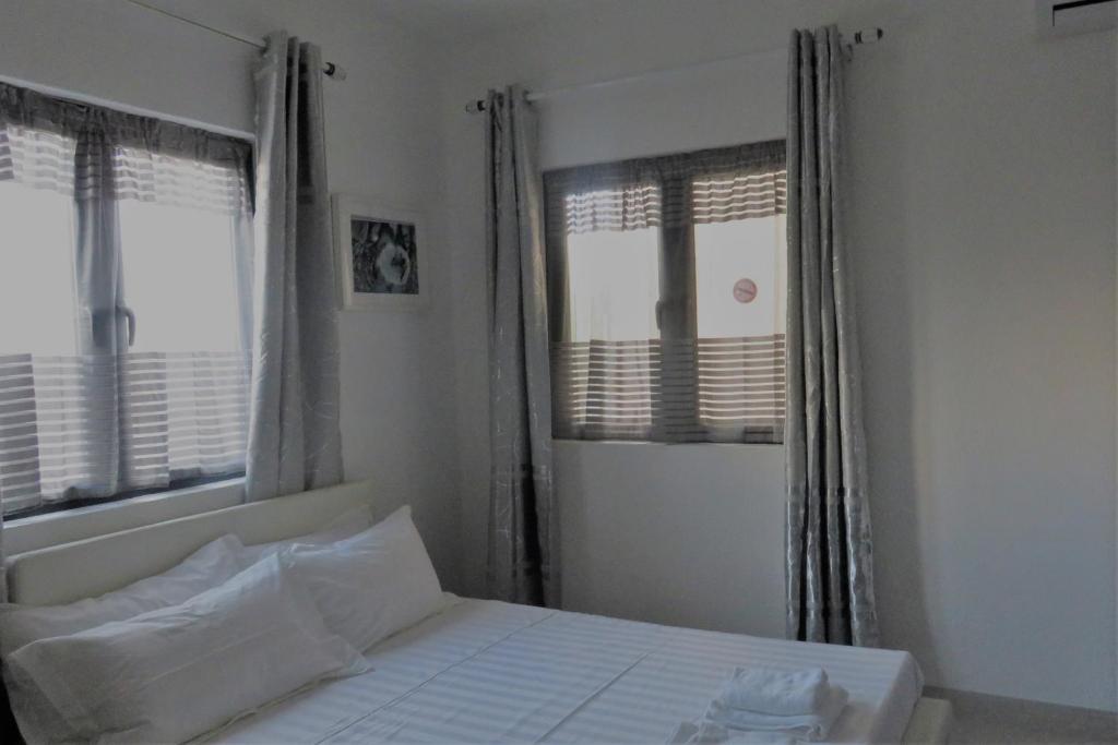 Postel nebo postele na pokoji v ubytování Ibiz Tourist Residence 2