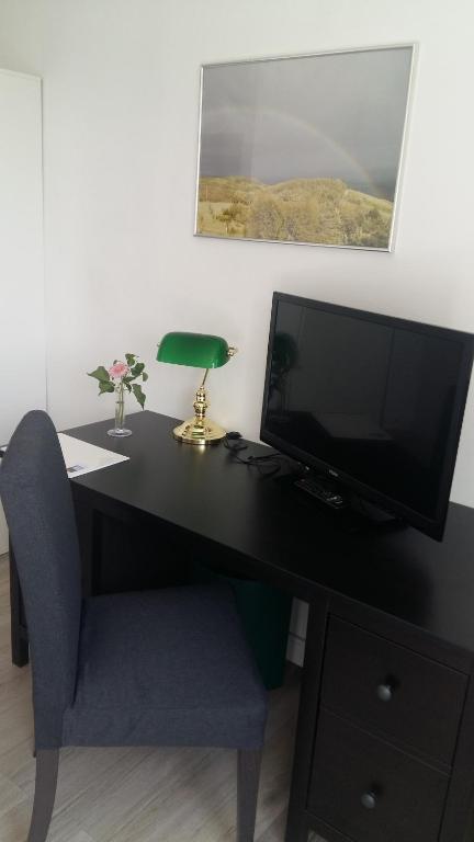 TV a/nebo společenská místnost v ubytování Zum Rebhang Bed & Breakfast