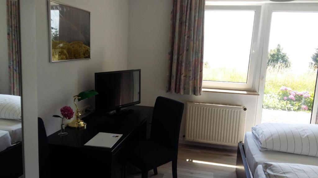 Postel nebo postele na pokoji v ubytování Zum Rebhang Bed & Breakfast