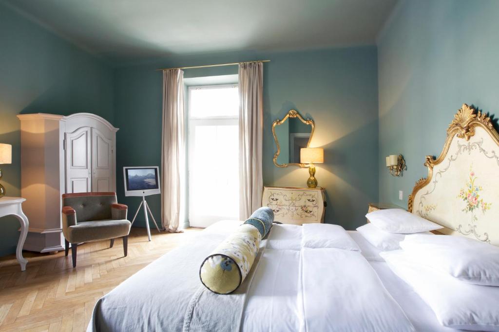 Posteľ alebo postele v izbe v ubytovaní Das REGINA Boutiquehotel