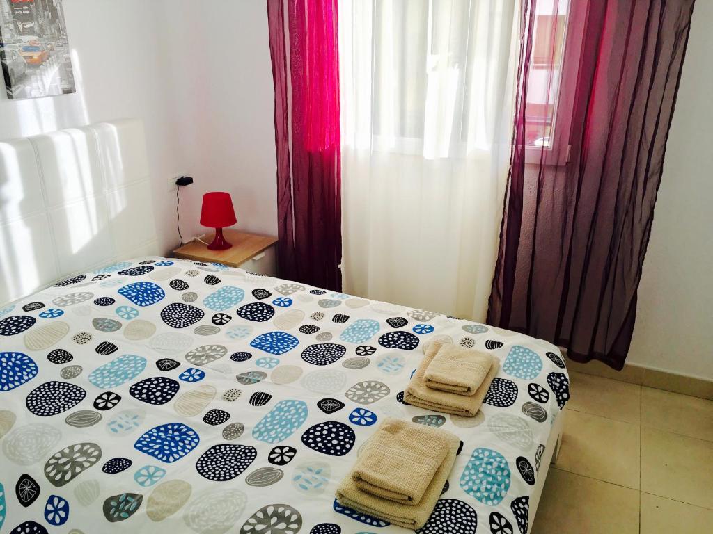 Postel nebo postele na pokoji v ubytování Apartment Aguila Real