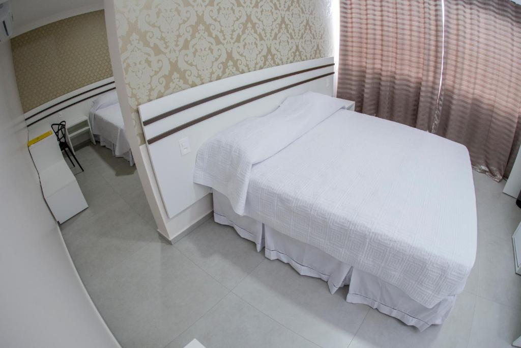 Postel nebo postele na pokoji v ubytování HOTEL HPR
