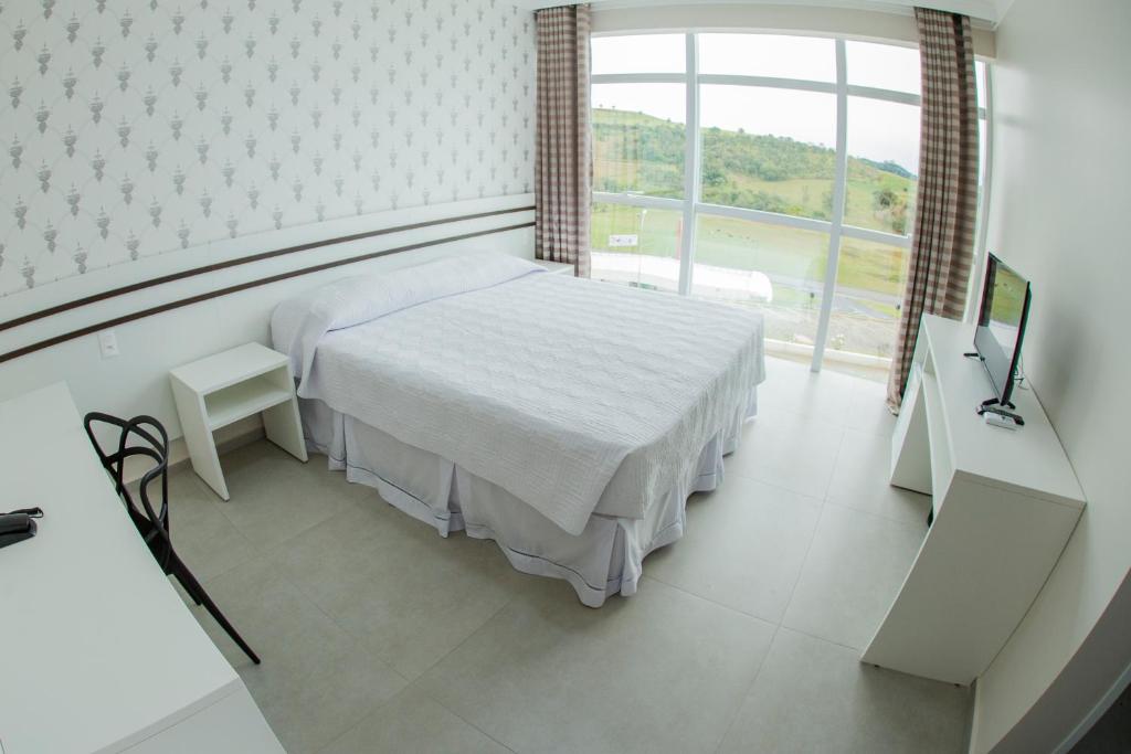 Postel nebo postele na pokoji v ubytování HOTEL HPR
