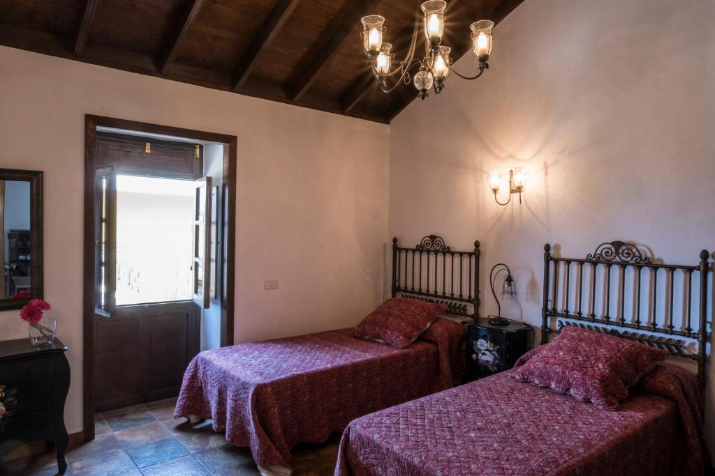 Postel nebo postele na pokoji v ubytování San Borondón