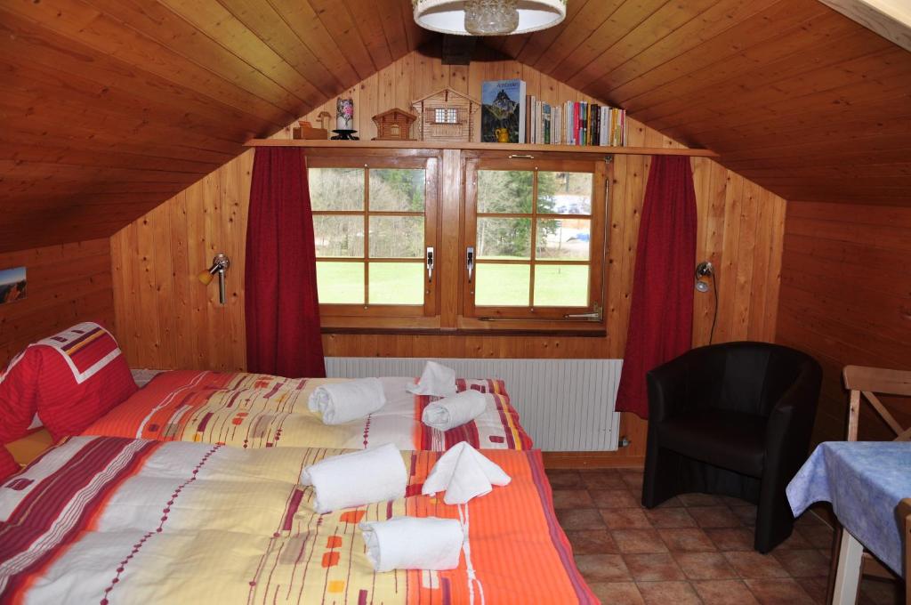 Postel nebo postele na pokoji v ubytování Chalet Allmegrat