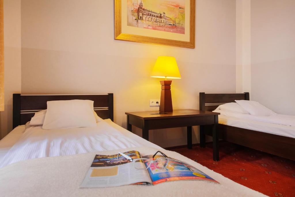 Posteľ alebo postele v izbe v ubytovaní Red Carpet Hostel