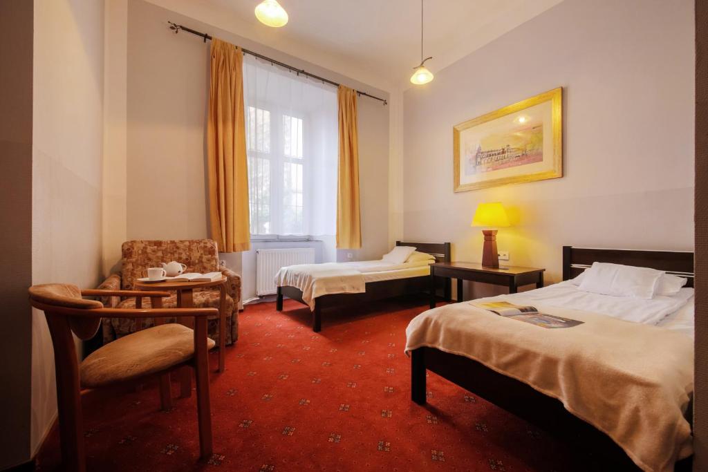 Posteľ alebo postele v izbe v ubytovaní Red Carpet Hostel