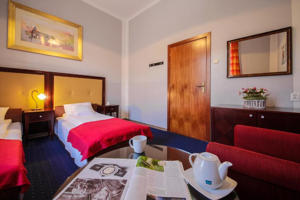 Posteľ alebo postele v izbe v ubytovaní Red Carpet Hostel
