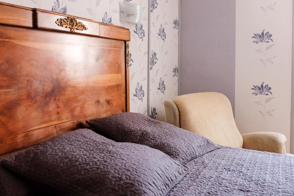 Postel nebo postele na pokoji v ubytování hôtel Piellenia