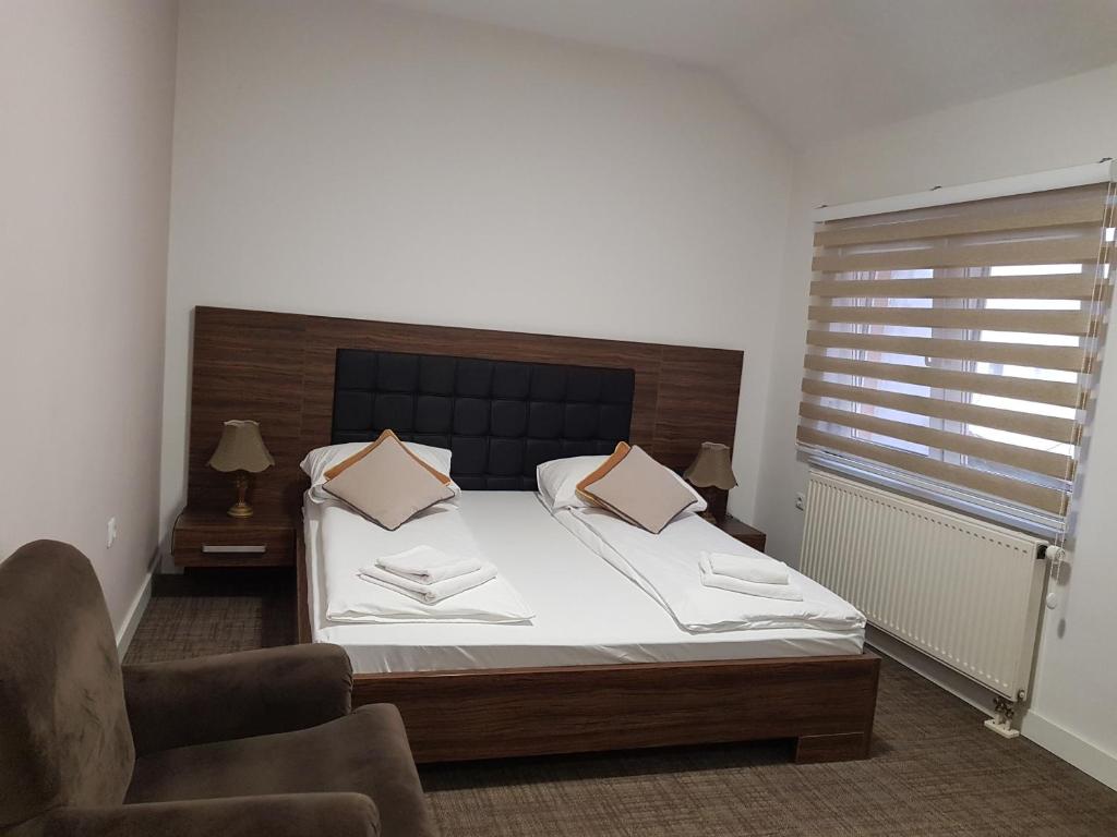 Postel nebo postele na pokoji v ubytování Hotel Story