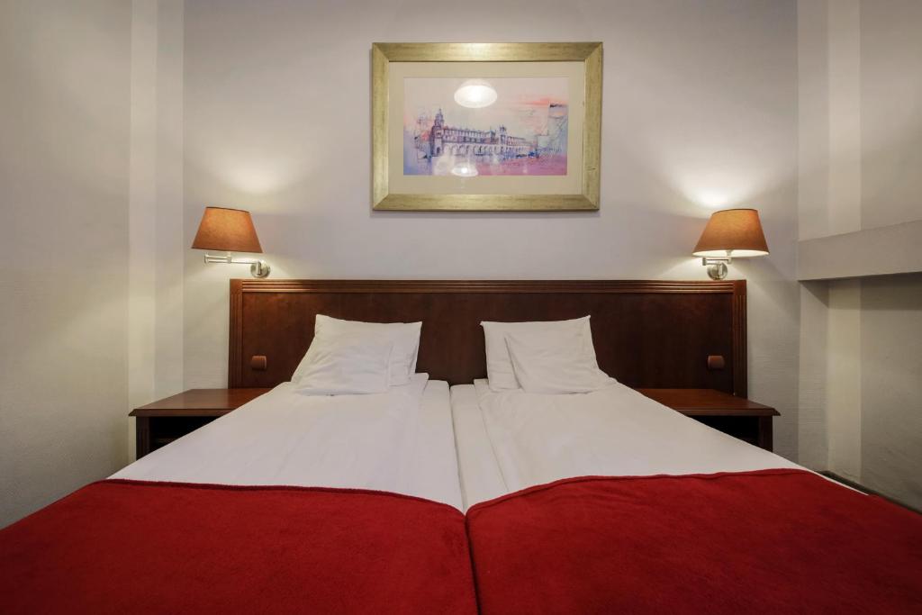 Posteľ alebo postele v izbe v ubytovaní Red Carpet Hostel