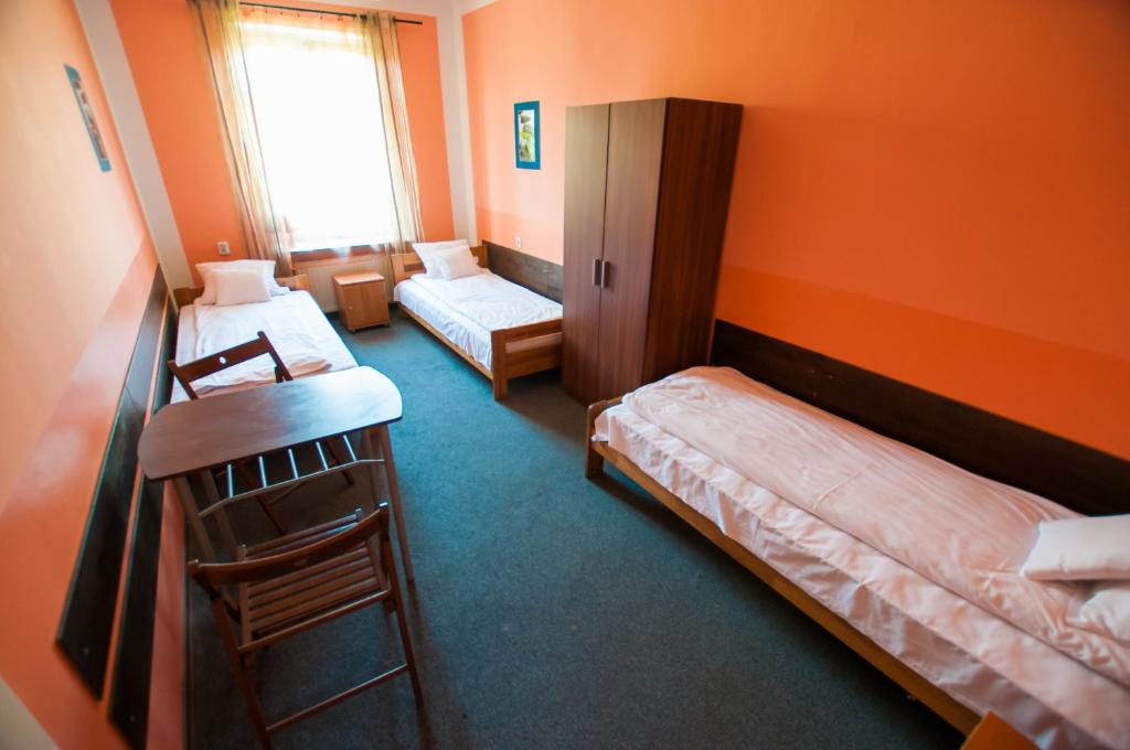 Posteľ alebo postele v izbe v ubytovaní Red Carpet Hostel
