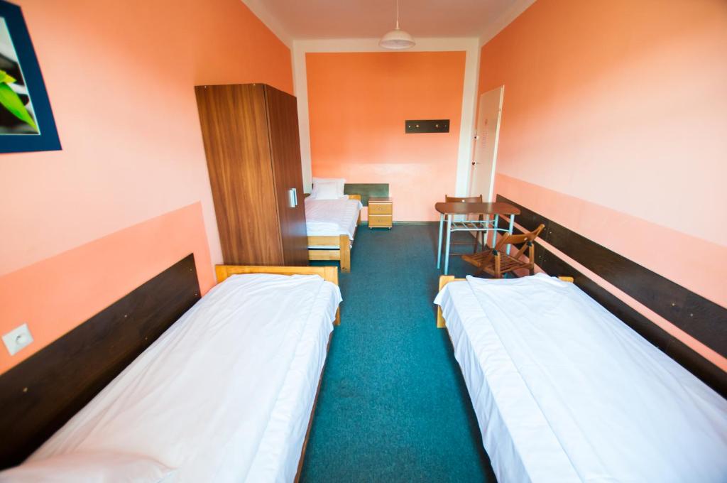 Posteľ alebo postele v izbe v ubytovaní Red Carpet Hostel