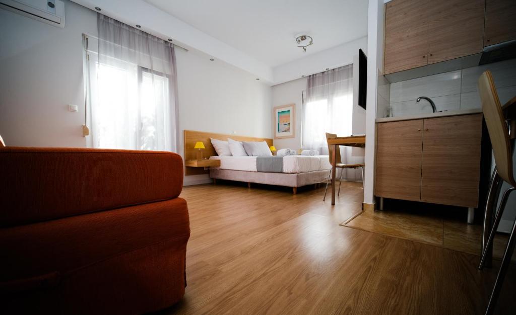 Posteľ alebo postele v izbe v ubytovaní Sappho Studios