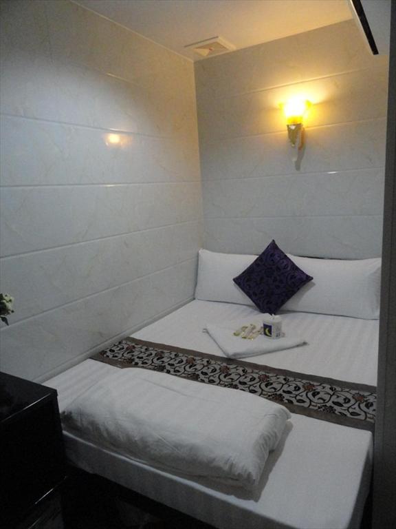 Postel nebo postele na pokoji v ubytování Singh Guest House