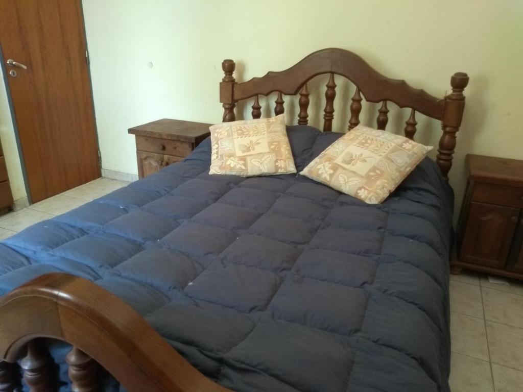 Una cama o camas en una habitación de Casa en Barrio Costa Azul