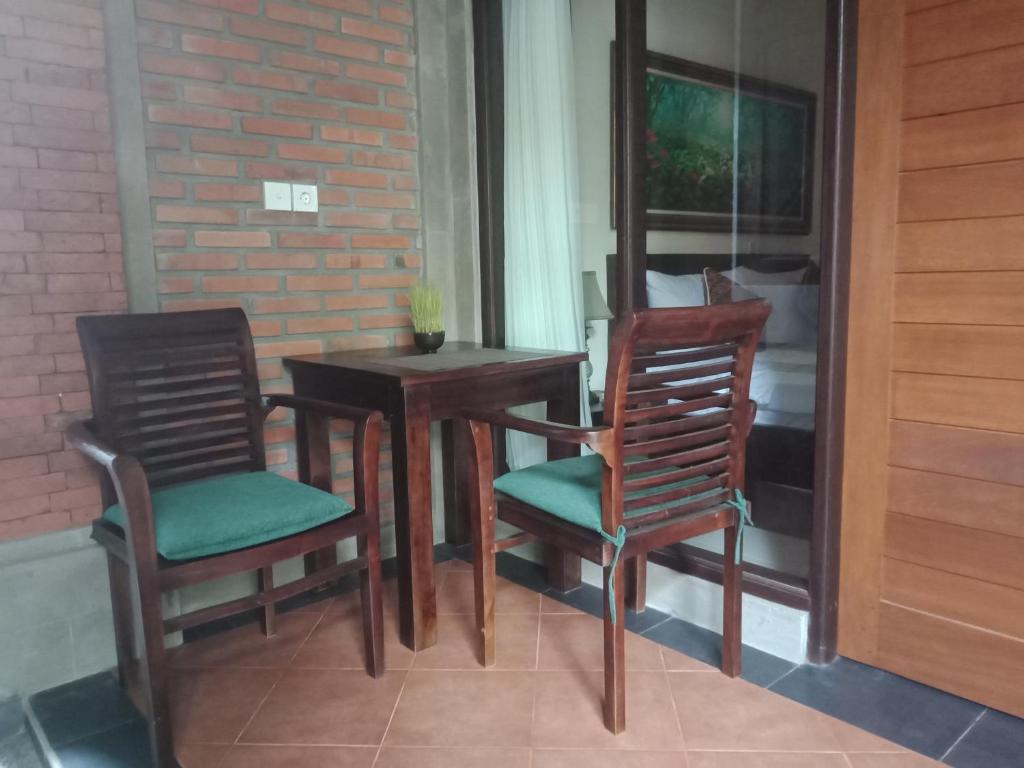 Posezení v ubytování Ubud Taksu Homestay