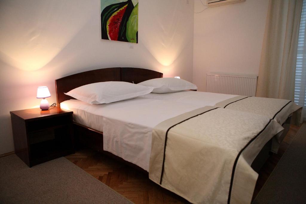 Postel nebo postele na pokoji v ubytování Hotel Ballet School