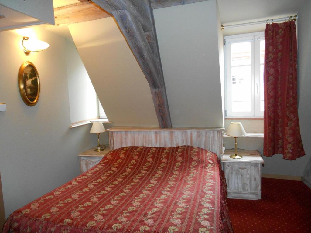 Postel nebo postele na pokoji v ubytování Hotel Saint-Martin