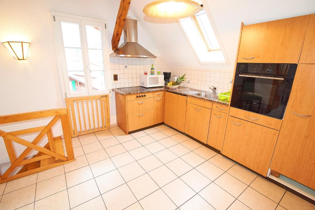 Kuchyň nebo kuchyňský kout v ubytování Residence Jungfrau