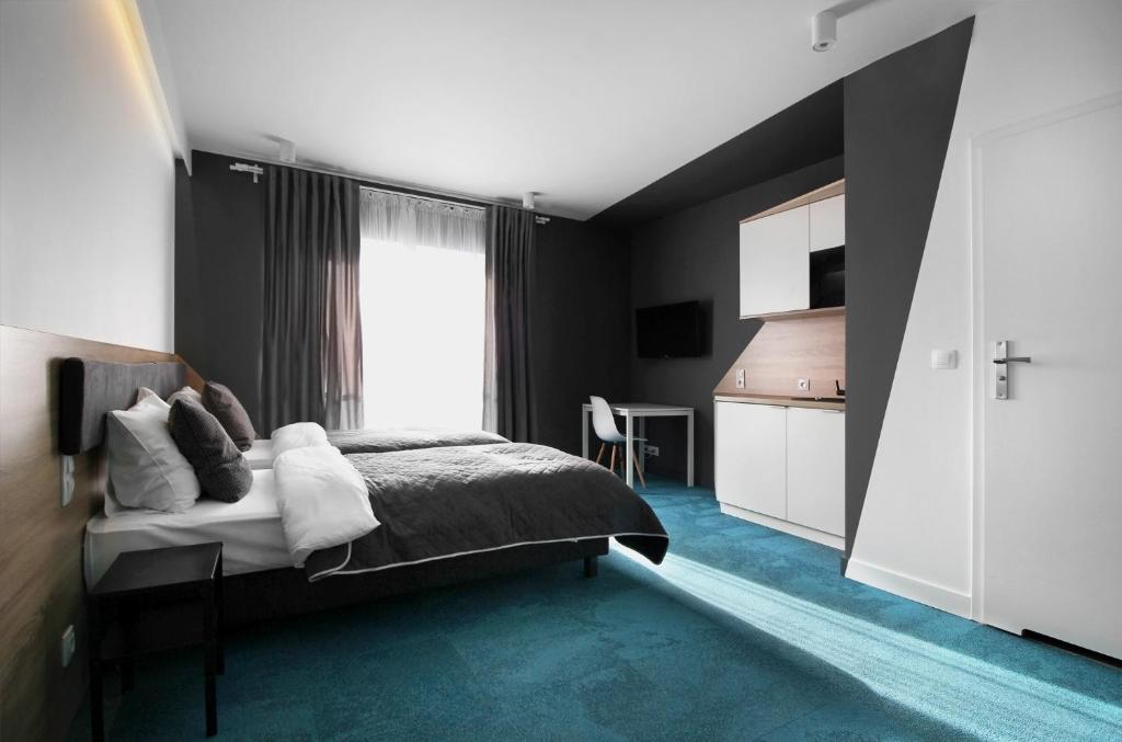 Posteľ alebo postele v izbe v ubytovaní Lemon Plaza Hotel