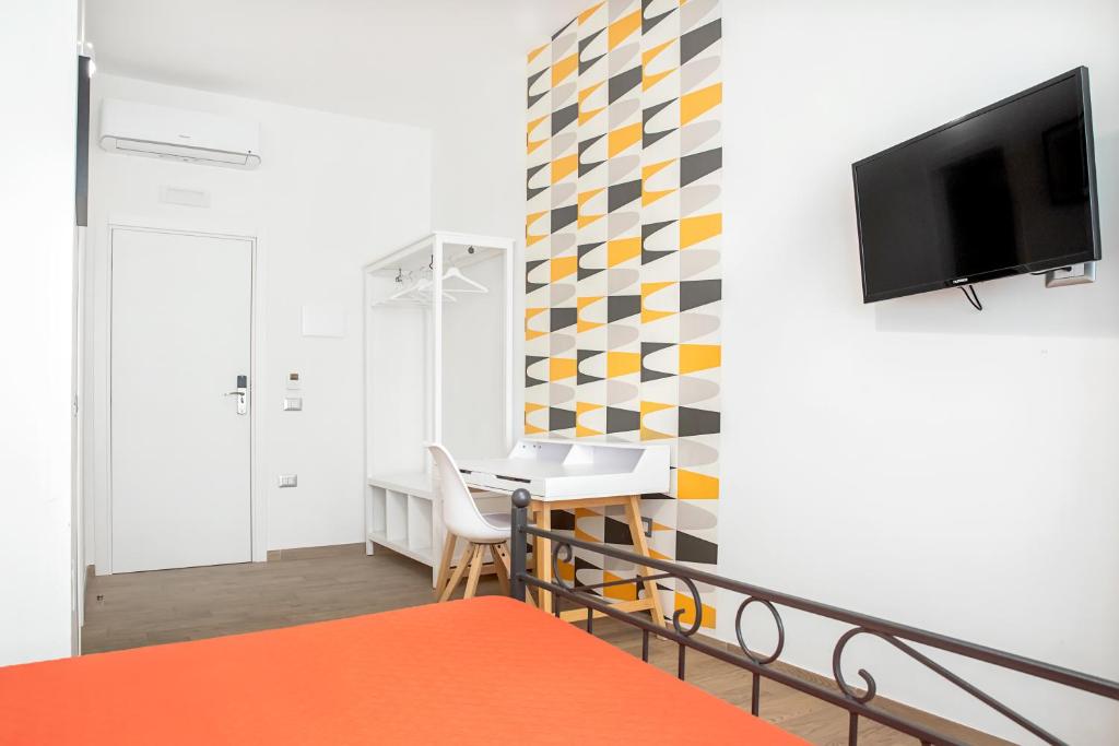 Łóżko lub łóżka w pokoju w obiekcie 1970 Rooms