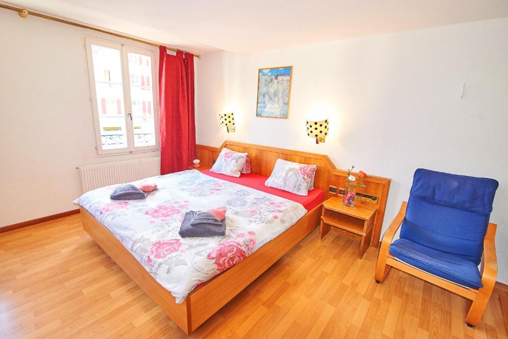 Postel nebo postele na pokoji v ubytování Residence Jungfrau