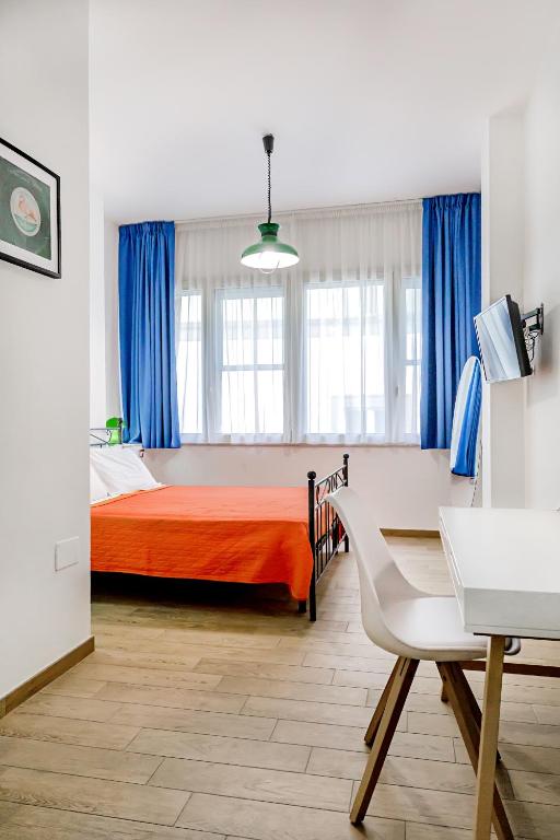 Łóżko lub łóżka w pokoju w obiekcie 1970 Rooms