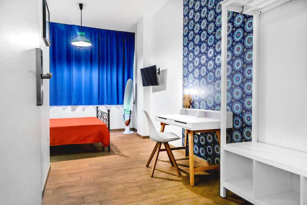 Łóżko lub łóżka w pokoju w obiekcie 1970 Rooms