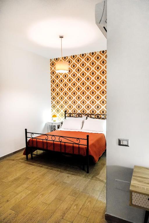 Łóżko lub łóżka w pokoju w obiekcie 1970 Rooms