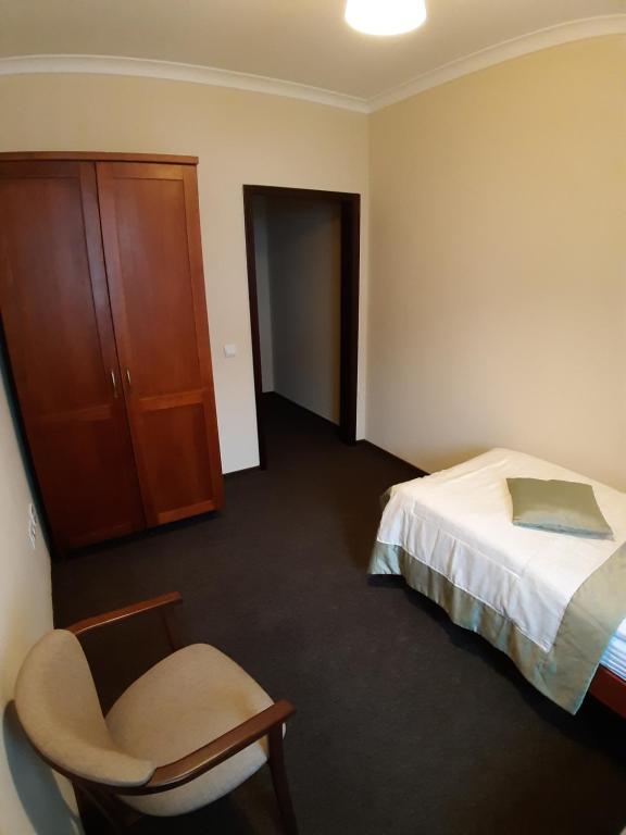 Postel nebo postele na pokoji v ubytování Hotel Patriarshyi