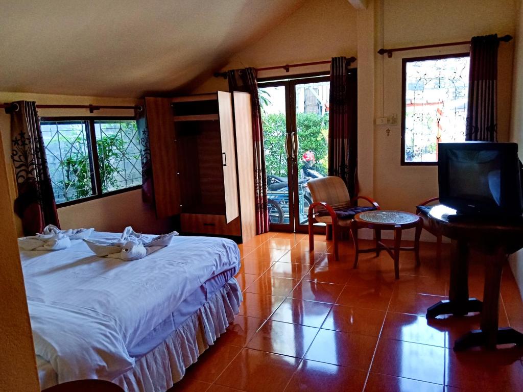 Postel nebo postele na pokoji v ubytování Kata Leaf Resort Phuket -