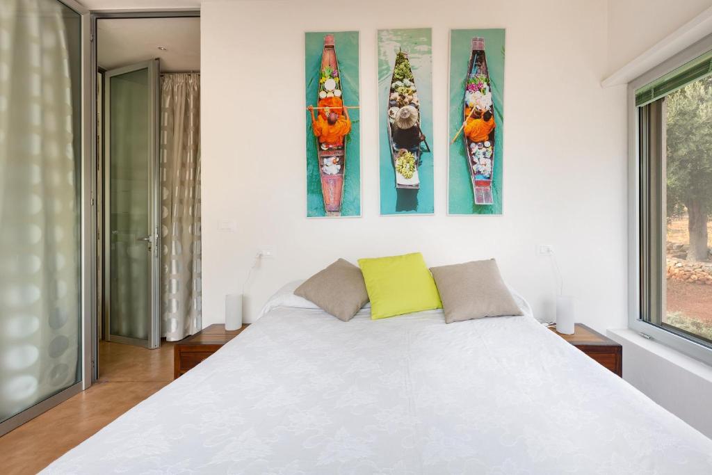 Łóżko lub łóżka w pokoju w obiekcie Villa Carlita by Perle di Puglia