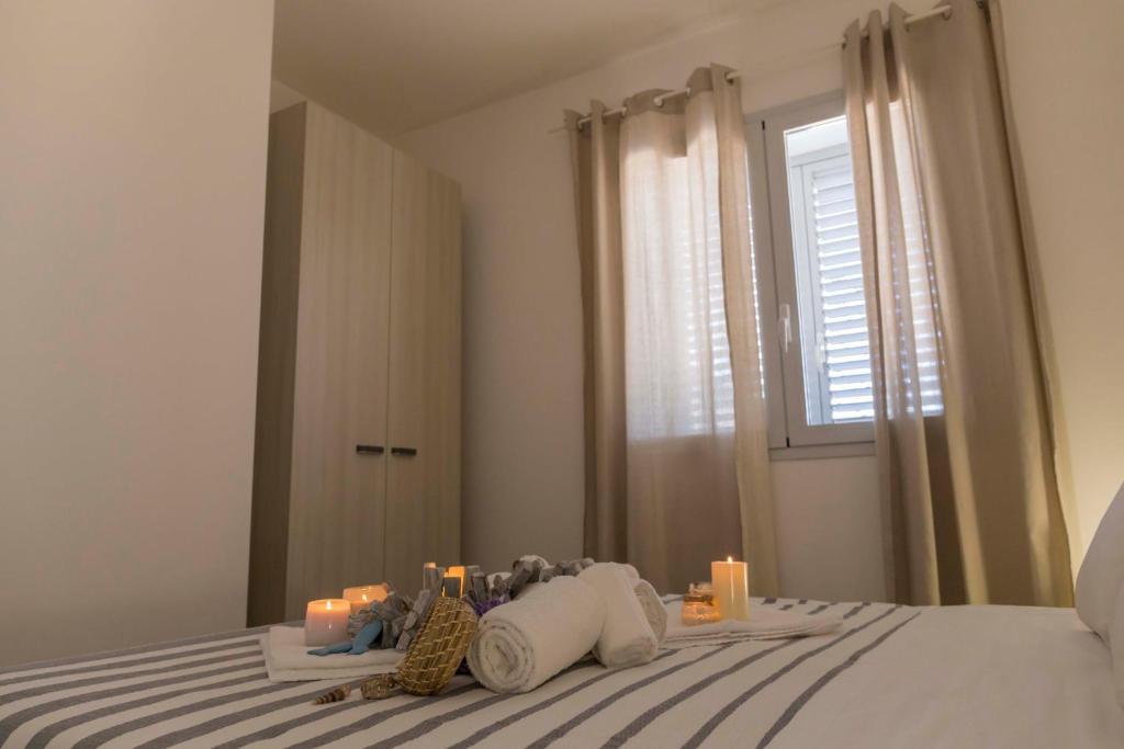 Katil atau katil-katil dalam bilik di MareinSicilia: Talia Residence