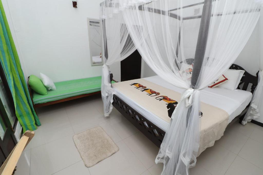 Postel nebo postele na pokoji v ubytování Aura