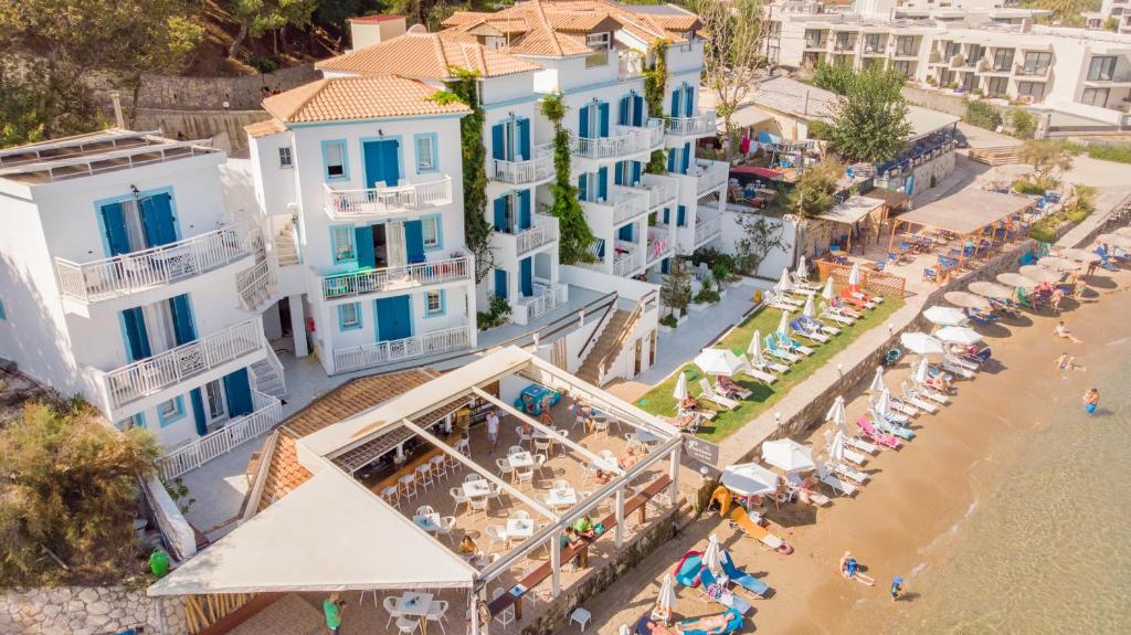 an aerial view of a resort with a beach and buildings at Filoxenia Beach in Tsilivi