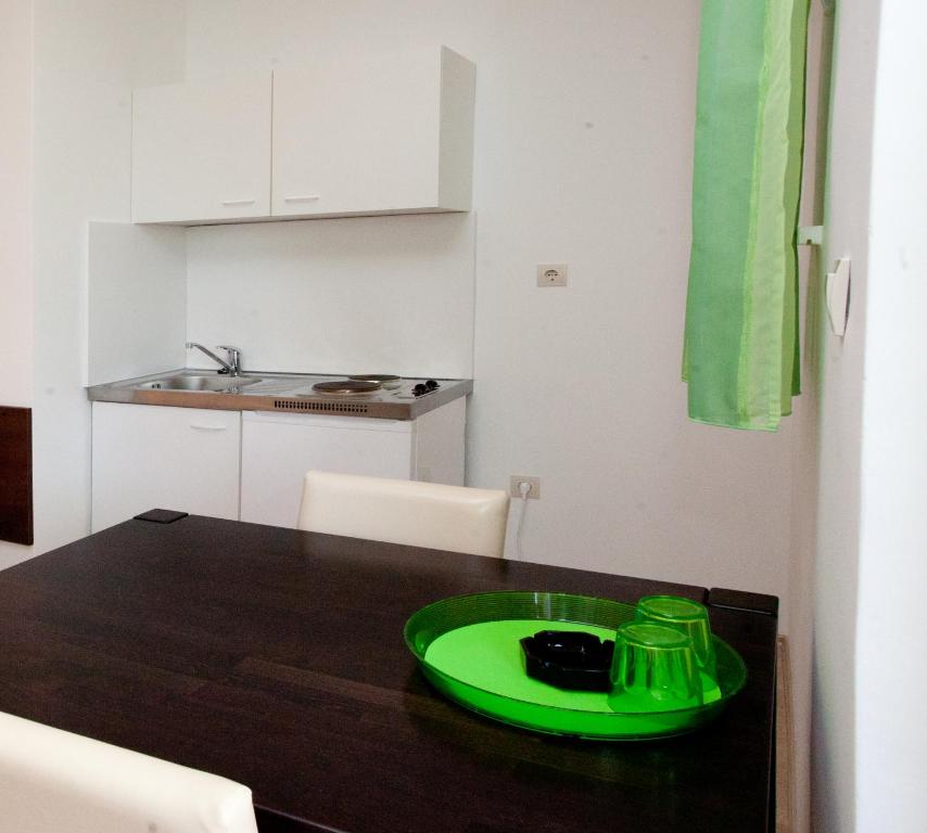 Kuchyň nebo kuchyňský kout v ubytování Apartments Klara