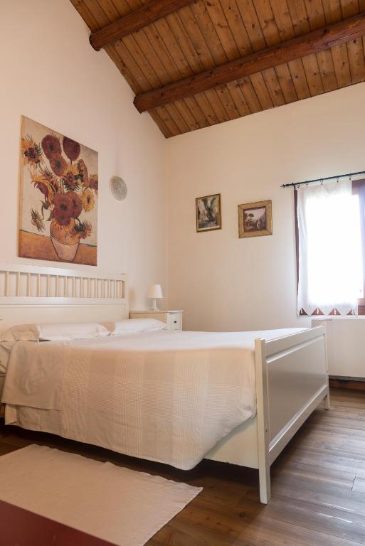 Postel nebo postele na pokoji v ubytování Agriturismo Corte Del Brenta