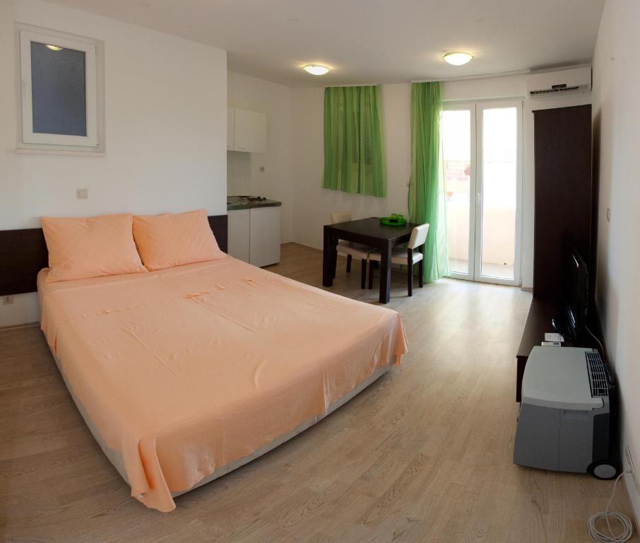 Postel nebo postele na pokoji v ubytování Apartments Klara
