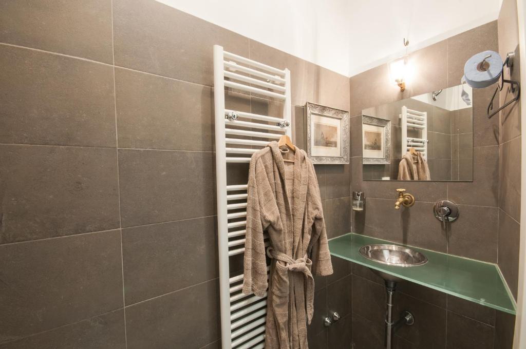 a bathroom with a sink and a towel at Agli incanti in Trieste